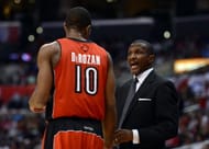 Head Coach Dwane Casey of the Toronto Raptors talks with DeMar DeRozan #10