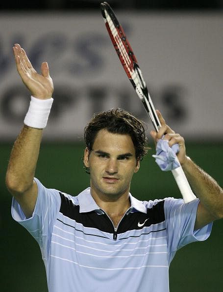 Roger Federer of Switzerland salutes the