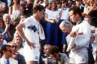 American tennis player John McEnroe (R) holds the