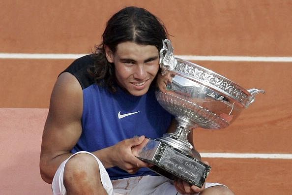 Spain&#039;s Rafael Nadal, poses with the trophy cup after his wi