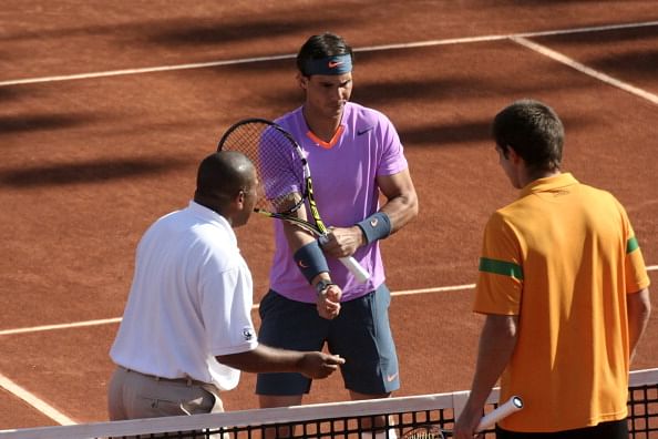 VINA DEL MAR, CHILE - FEBRUARY 06:  Rafael Nadal of Spain talks to Federico Delbonis of Argentina during the 2013 Open VTR
