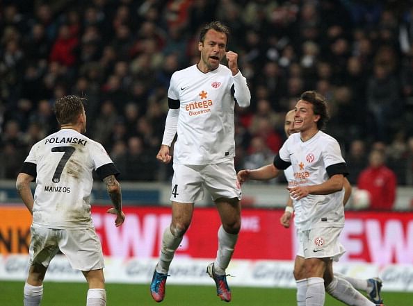Nikolce Noveski (C) celebrates scoring the 3-0 during the German first division Bundesliga football match Eintracht Frankfurt vs FSV Mainz 05