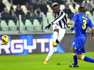 Juventus' Paul Pogba fires a shot and scores during a Serie A match between Juventus and Udinese at the Juventus Stadium in Turin, Italy.