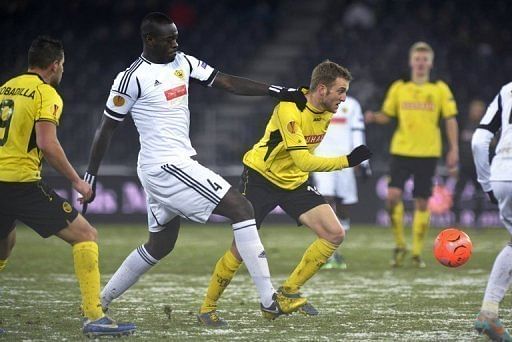 Christopher Samba (2nd L) in action for Anzhi Makhachkala against Young Boys on December 6, 2012
