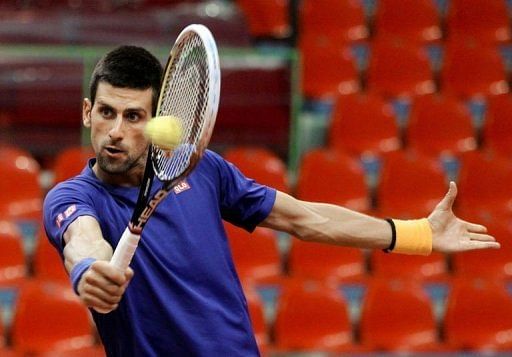 Serbia&#039;s Novak Djokovic hits a return on January 31, 2013 in Charleroi