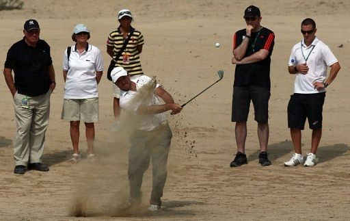 Richard Sterne plays a shot during the second round of the Dubai Desert Classic on February 1, 2013
