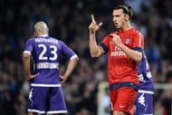 Paris Saint-Germain's forward Zlatan Ibrahimovic (R) celebrates after scoring on February 1, 2013 in Toulouse