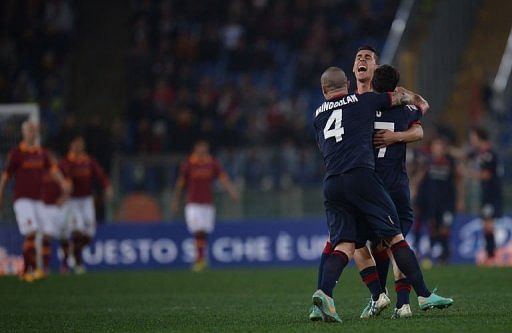 Cagliari&#039;s forward Marco Sau celebrates with teamates after scoring in Rome&#039;s Olympic Stadium on Febuary 1, 2013