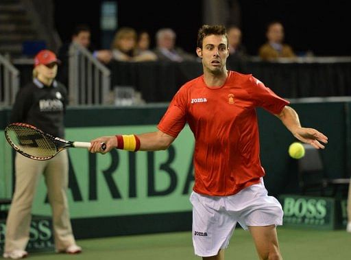 Spain&#039;s Granollers plays against Frank Dancevic of Canada on February 1, 2013