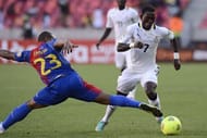 Ghana's midfielder Christian Atsu (R) clashes with Cape Verde's defender Carlitos on February 2, 2013