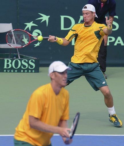 Lleyton Hewitt of Australia and his partner Christopher Guccione in Kaohsiung ,Taiwan on February 2, 2013.