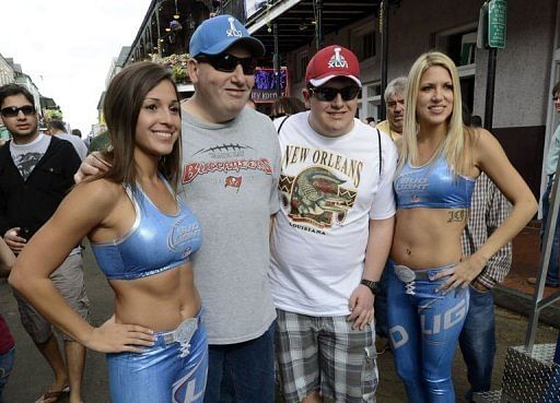 Super Bowl fans and locals party in the French Quarter in New Orleans on Febuary 2, 2013 on the eve of Super Bowl XLVII