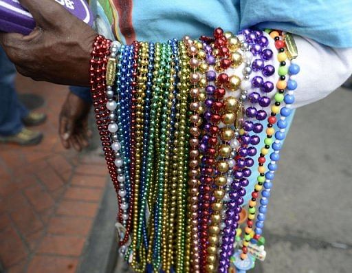 Super Bowl fans and locals party in the French Quarter in New Orleans Febuary 2, 2013 on the eve of Super Bowl XLVII