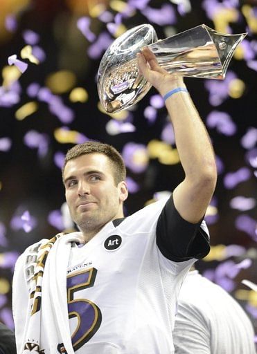 Joe Flacco of the Baltimore Ravens holds aloft the Vince Lombardi Trophy following their victory on February 3, 2013