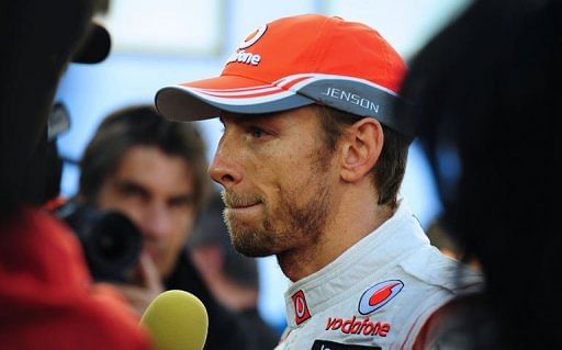 McLaren&#039;s driver Jenson Button speaks to the media during a training session at the Jerez racetrack on February 5, 2013