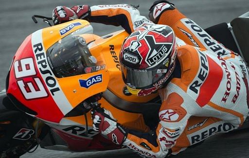 Marc Marquez of Spain speeds through a corner at the Sepang circuit outside Kuala Lumpur on February 6, 2013