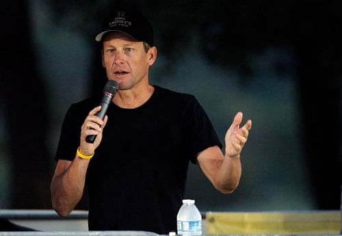 Cyclist Lance Armstrong addresses participants at the Livestrong Challenge Ride on October 21, 2012, in Austin, Texas