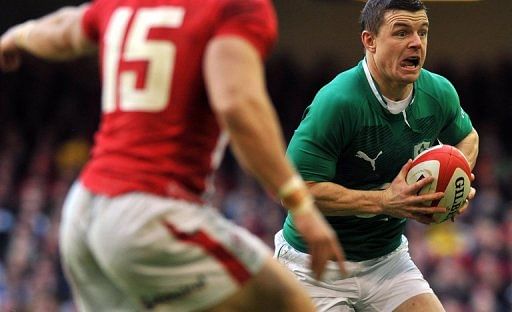Ireland&#039;s Brian O&#039;Driscoll (R) runs with the ball during the Six Nations Rugby Union match on February 2, 2013