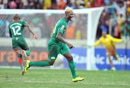Burkina Faso's forward Aristide Bance (C) celebrates at the end of a penalty shoot out on February 6, 2013