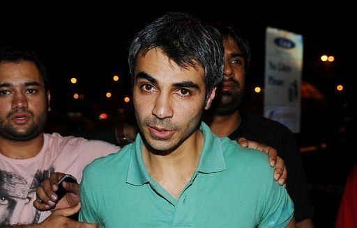 Former Pakistan cricket captain Salman Butt arrives at the airport in Lahore on June 22, 2012