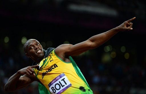 Jamaica&#039;s Usain Bolt celebrates winning the men&#039;s 100m final at the London 2012 Olympic Games on August 5, 2012