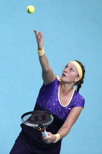 Petra Kvitova serves to Swiss Stefanie Voegele at the Paris WTA Open on January 30, 2013