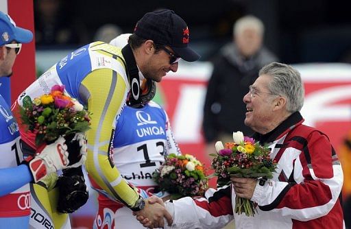 President of Austria Heinz Fischer (right) greets Norway&#039;s Aksel Lund Svindal in Schladming, Austria on February 9, 2013