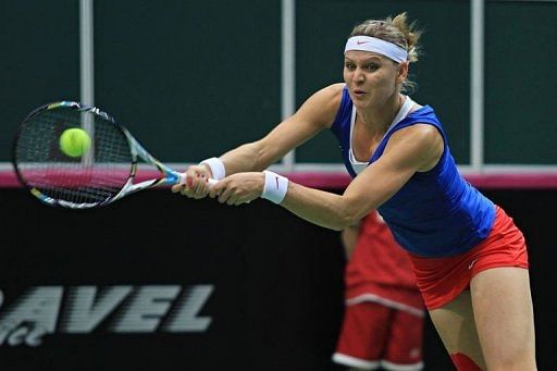 Czech Republic&#039;s Lucie Safarova returns the ball to Australia&#039;s Samantha Stosur in Ostrava on February 9, 2013