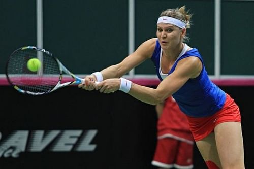 Czech Republic's Lucie Safarova returns the ball to Australia's Samantha Stosur in Ostrava on February 9, 2013