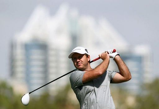 Richard Sterne of South Africa tees off in Dubai, on February 3, 2013