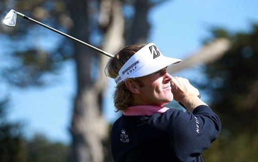 Brandt Snedeker watches his tee shot on the 17th hole on February 9, 2013 in Pebble Beach, California