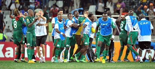 Burkina Faso&#039;s players celebrate beating Ghana on penalties on February 6, 2013 in Nelspruit