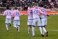 Evian's Yannick Sagbo (2nd R) celebrates with teammates on February 10, 2013 in Annecy