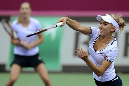 Russia&#039;s Elena Vesnina (R) and Ekaterina Makarova in Moscow on February 10, 2013.