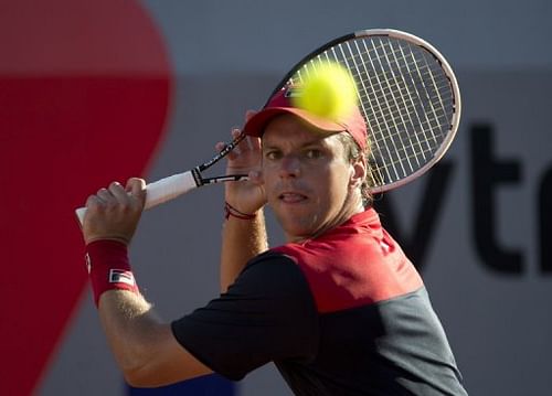 Argentina's Horacio Zeballos hits a return to Rafael Nadal, in Vina del Mar, on February 10, 2013