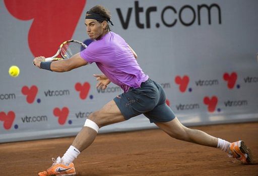Rafael Nadal hits a return to Horacio Zeballos, in Vina del Mar, on February 10, 2013