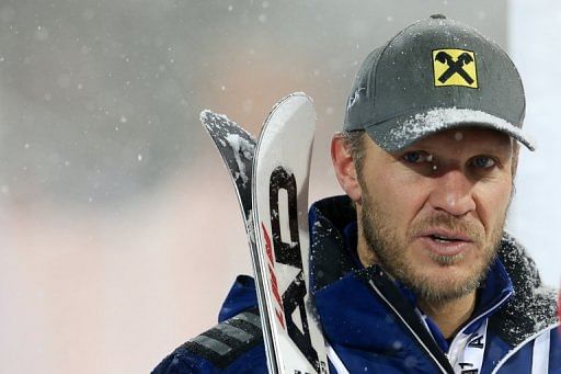 Hermann Maier looks on after a ski exhibition night race in Flachau on January 14, 2013