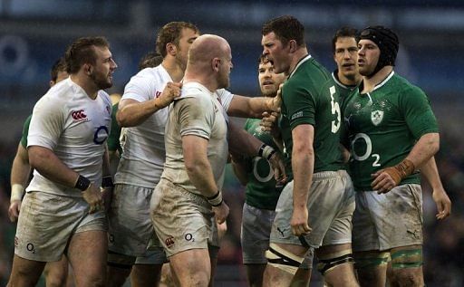 Dan Cole (3rd L) goes head to head with Donnacha Ryan after incident with Cian Healy (R) in Dublin on February 10, 2013
