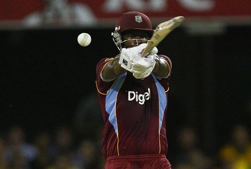 Johnson Charles of the West Indies hits a shot against Australia during their T20 match in Brisbane on February 13, 2013