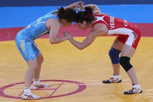 Canada&#039;s Tonya Lynn Verbeek wrestles Japan&#039;s Saori Yoshida in a 55kg freestyle Olympic gold match on August 9, 2012