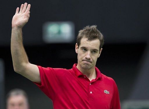 Richard Gasquet reacts after winning his match in Rotterdam on February 13, 2013