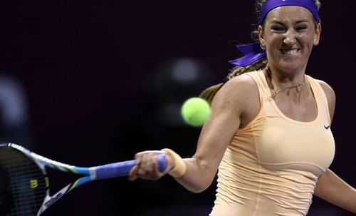 Victoria Azarenka hits a return to Romina Oprandi on February 13, 2013 in the Qatari capital Doha