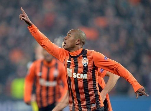 Douglas Costa celebrates scoring for Shakhtar Donetsk against Borussia Dortmund, on February 13, 2013