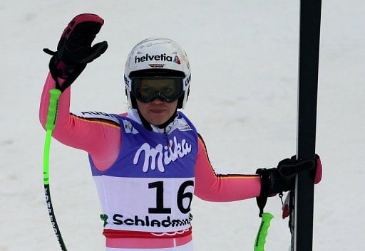 Viktoria Rebensburg waves to the crowd after a run in the super-G event of the world championships, on February 5, 2013