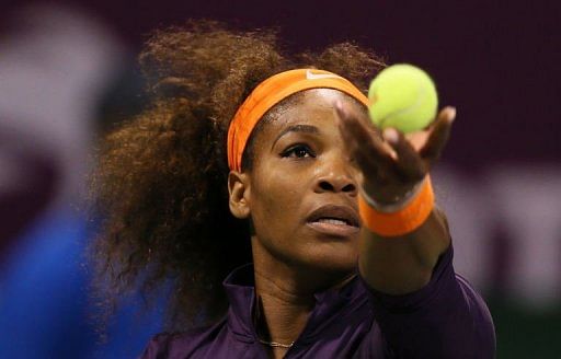 Serena Williams serves on February 14, 2013 in Doha