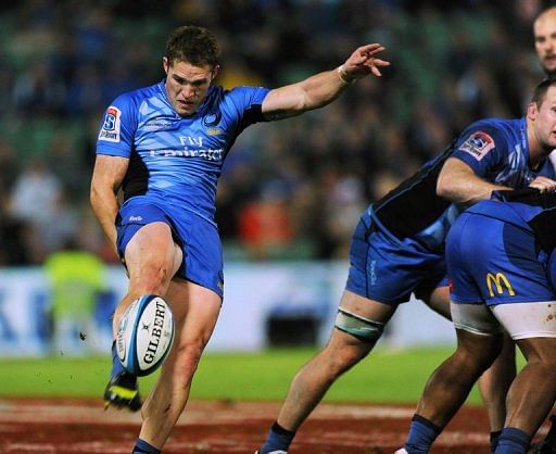 Josh Holmes of the Western Force makes a clearing kick, in Perth, on May 26, 2012