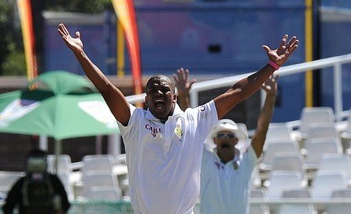 Vernon Philander successfuly appeals the wicket of Umar Gul during their second Test in Cape Town on February 15, 2013
