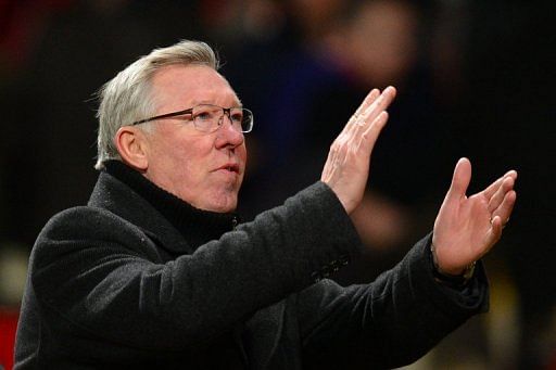 Alex Ferguson acknowledges the crowd after a match at Old Trafford, Manchester on February 10, 2013