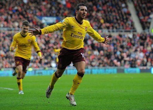 Arsenal midfielder Santi Cazorla celebrates after scoring a goal during the match against Sunderland, February 9, 2013