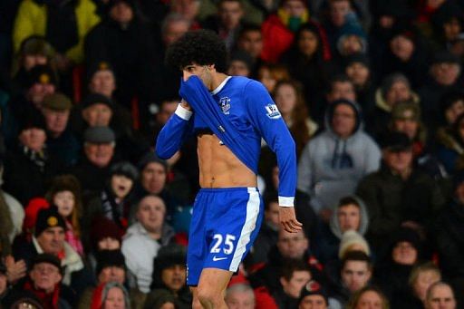 Everton&#039;s Marouane Fellaini reacts during the match against Manchester United at Old Trafford on February 10, 2013